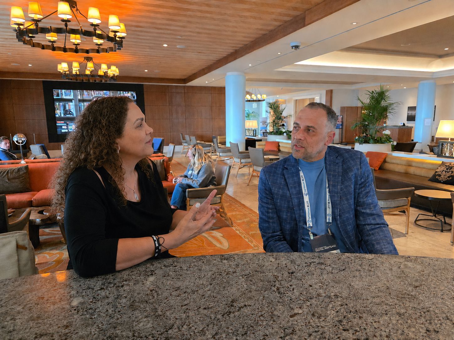 Suha Beidas Zehl, CMB®, AMSP™ in conversation at a conference