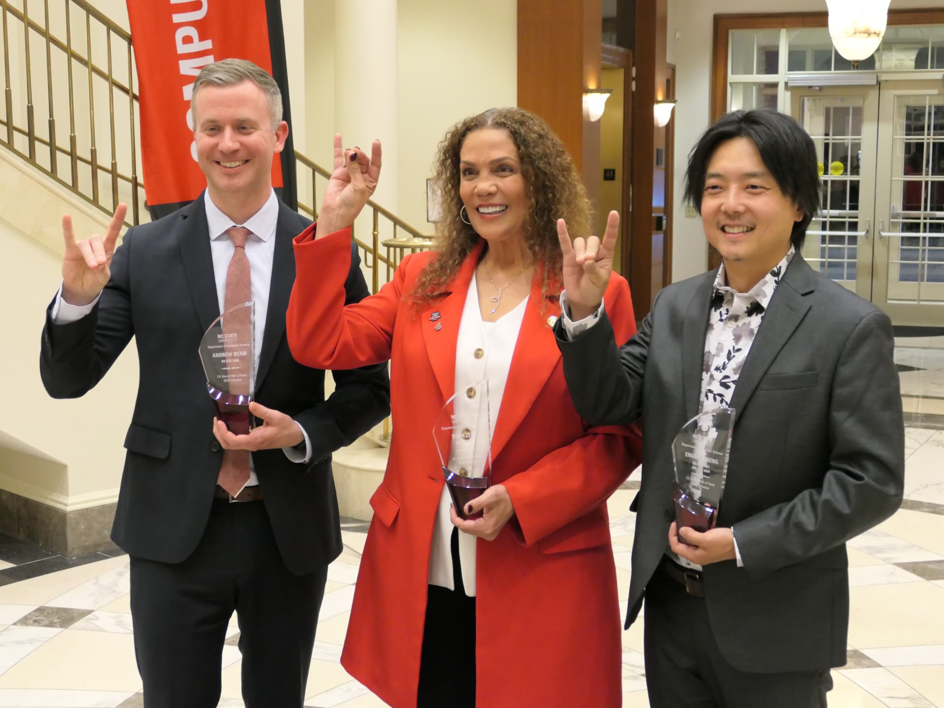 Suha Beidas Zehl with fellow NC State Computer Science Hall of Fame inductees holding their awards