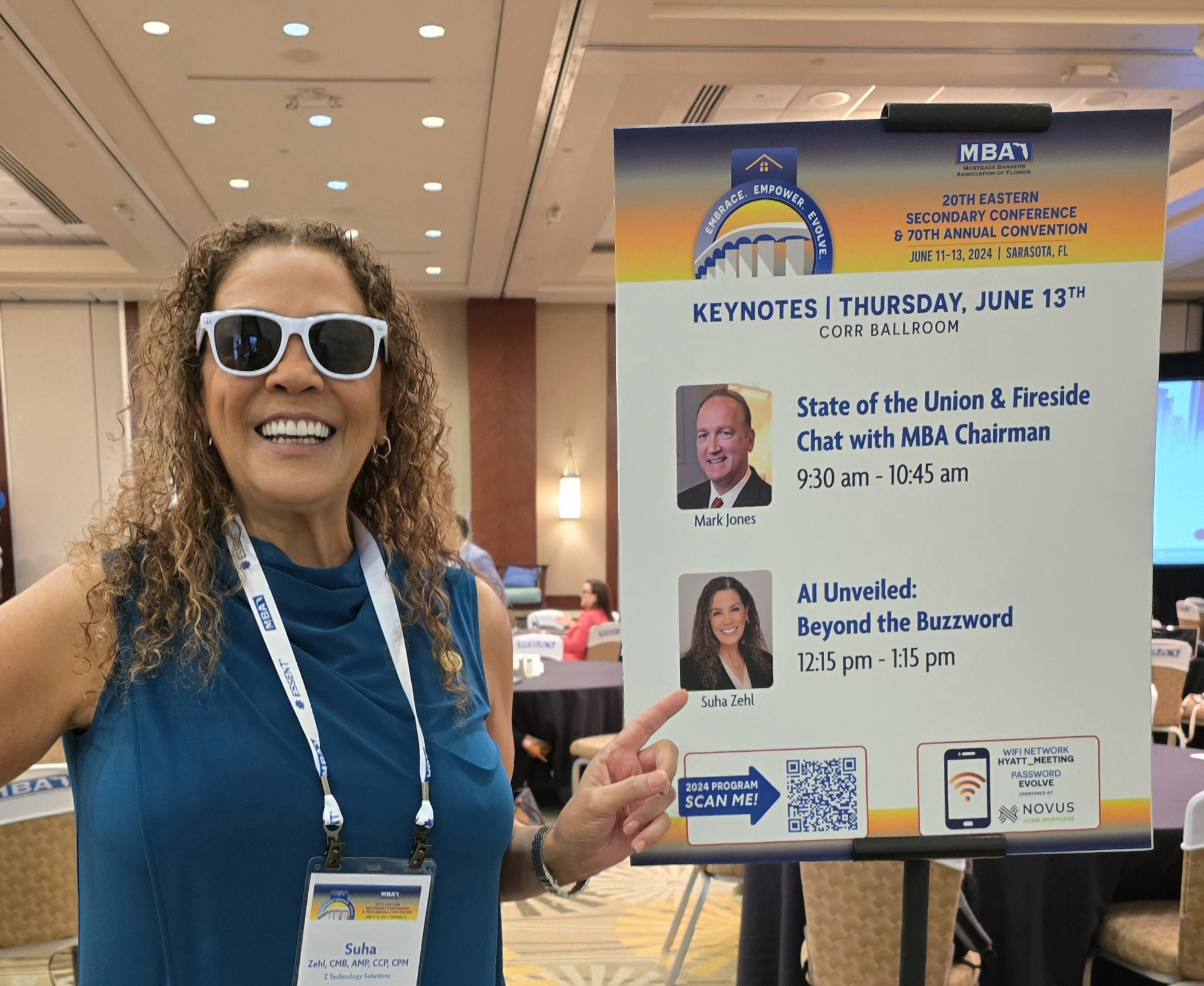 Suha Beidas Zehl, CMB®, AMSP™ beside her MBA of Florida keynote sign, AI Unveiled: Beyond the Buzzword